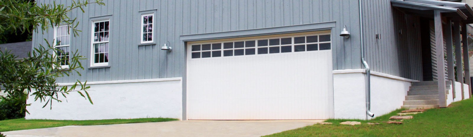 wood garage door with flush panels